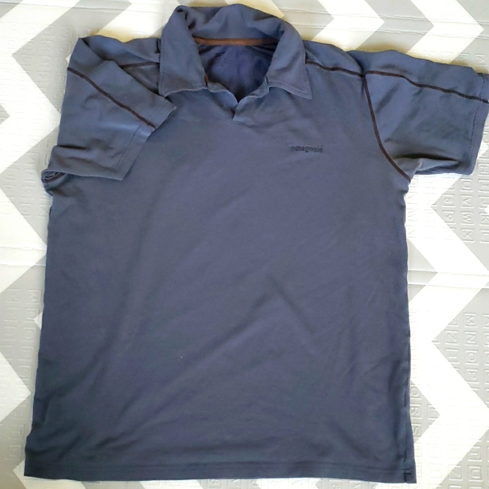 Patagonia V neck collar polo.  Gray with brown .  Organic cotton.  Size Medium
